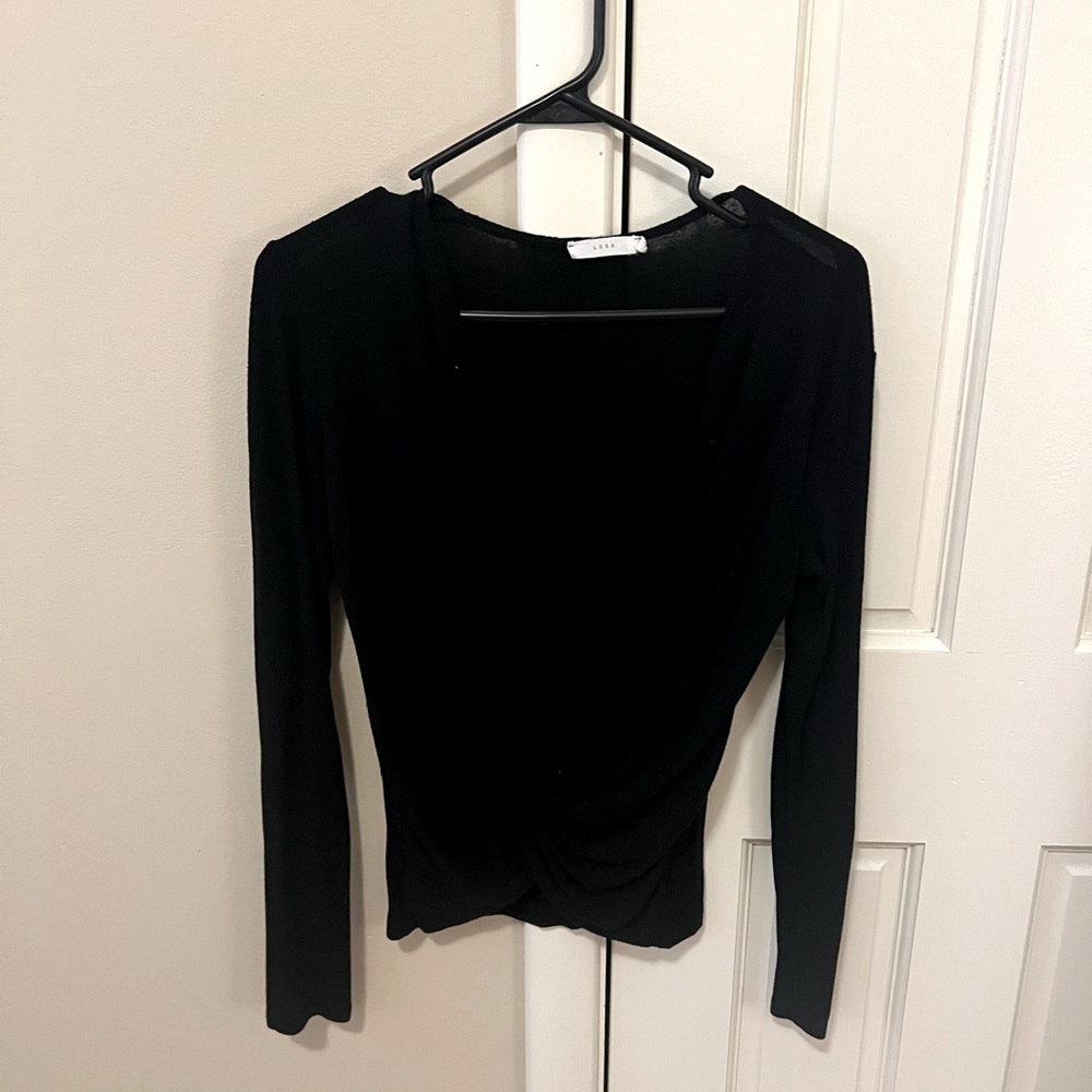 Lush brand cross front, long sleeve shirt, free beauty gift with purchase.